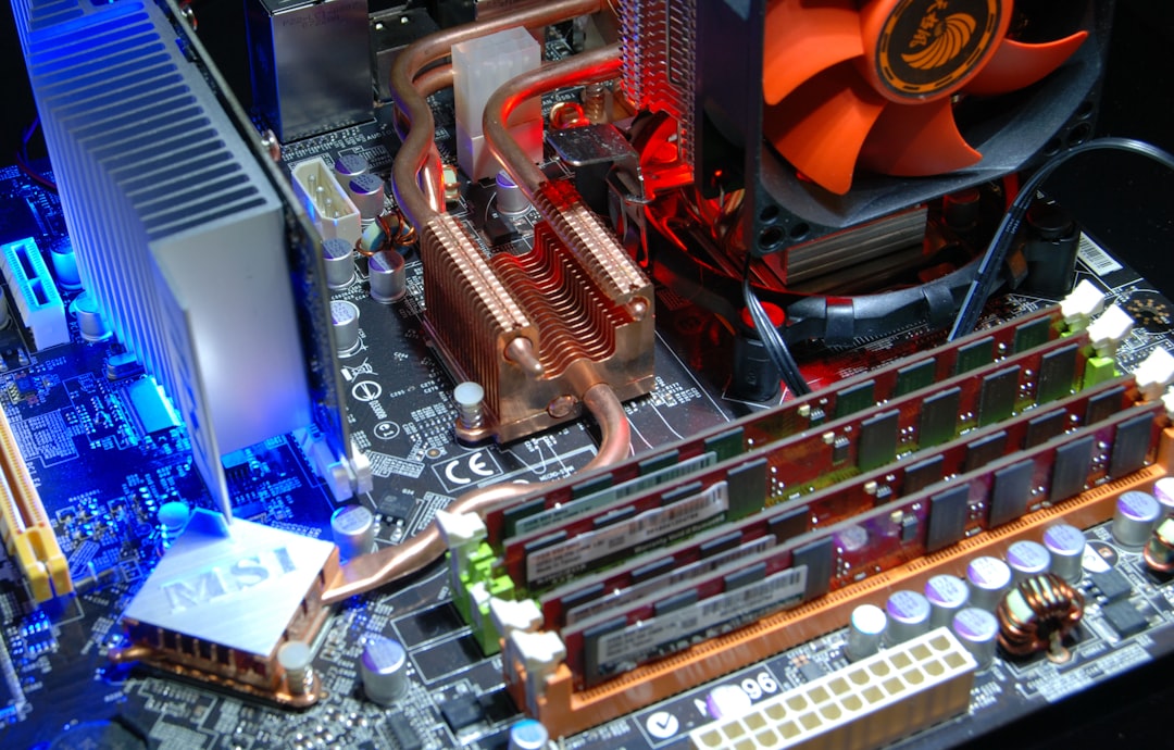 computer-motherboard-with-ram-sticks-and-aftermarket-cooling-system-xskelgslv2s